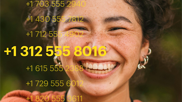 Close-up portrait showing a bright, genuine smile against a blurred green background, with yellow phone numbers overlaid on the right side